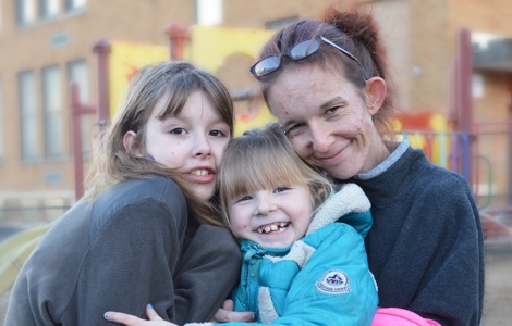 Staci and her daughters receive healthy groceries every month from GBFB’s School-based Pantry at the Connery School in Lynn.