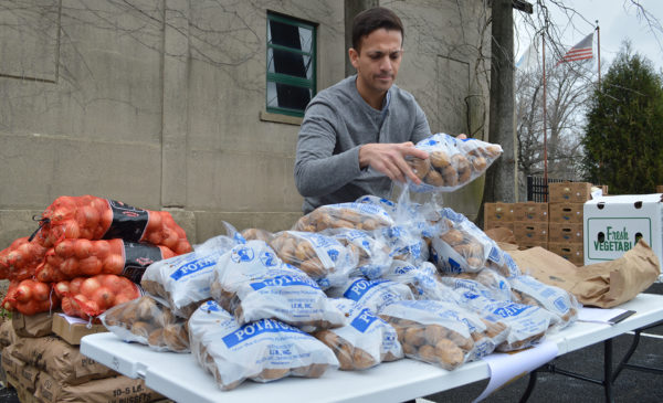 Fresh produce distributions at health centers like Charles River Community Health are part of GBFB's efforts to solve food insecurity and the health problems it causes.