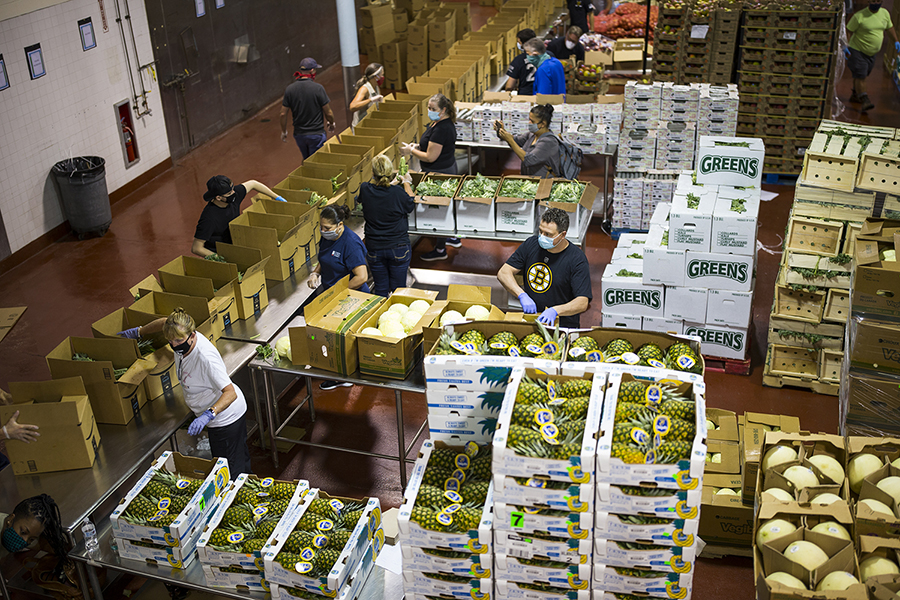 Sorting and packaging food at BPS Central Kitchen.