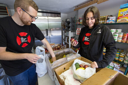 Packing food at AIDS Support Group Cape Cod