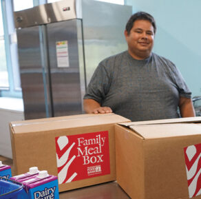 Pedro with GBFB's Family Meal Boxes