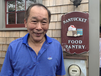 Nantucket food pantry client Chin M. smiling at the camera