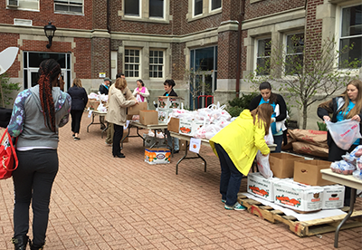 College students picking up food at a Mobile Market