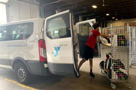Unloading the YMCA Boston van