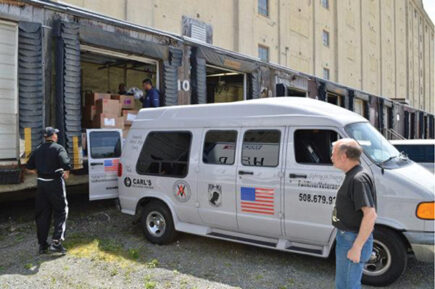 Loading a van with food at a GBFB cross dock