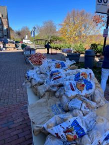 table with bags of fresh produce