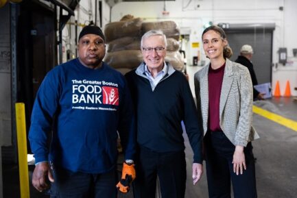 GBFB Policy Manager poses with GBFB Warehouse Employees