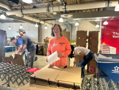 Janet volunteering in the GBFB warehouse